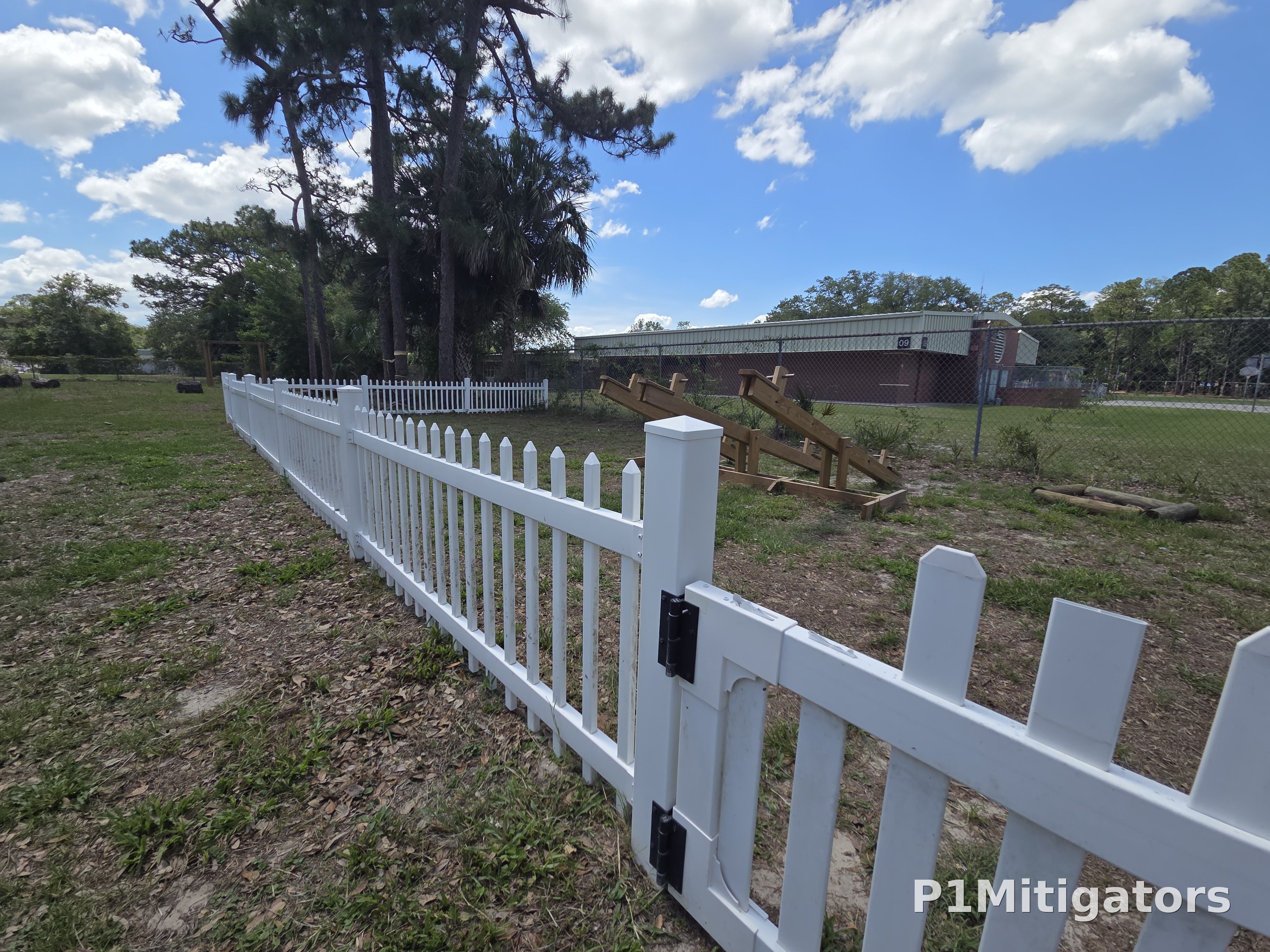 White Picket Fencing project photo 3 by P1Mitigators Jacksonville FL