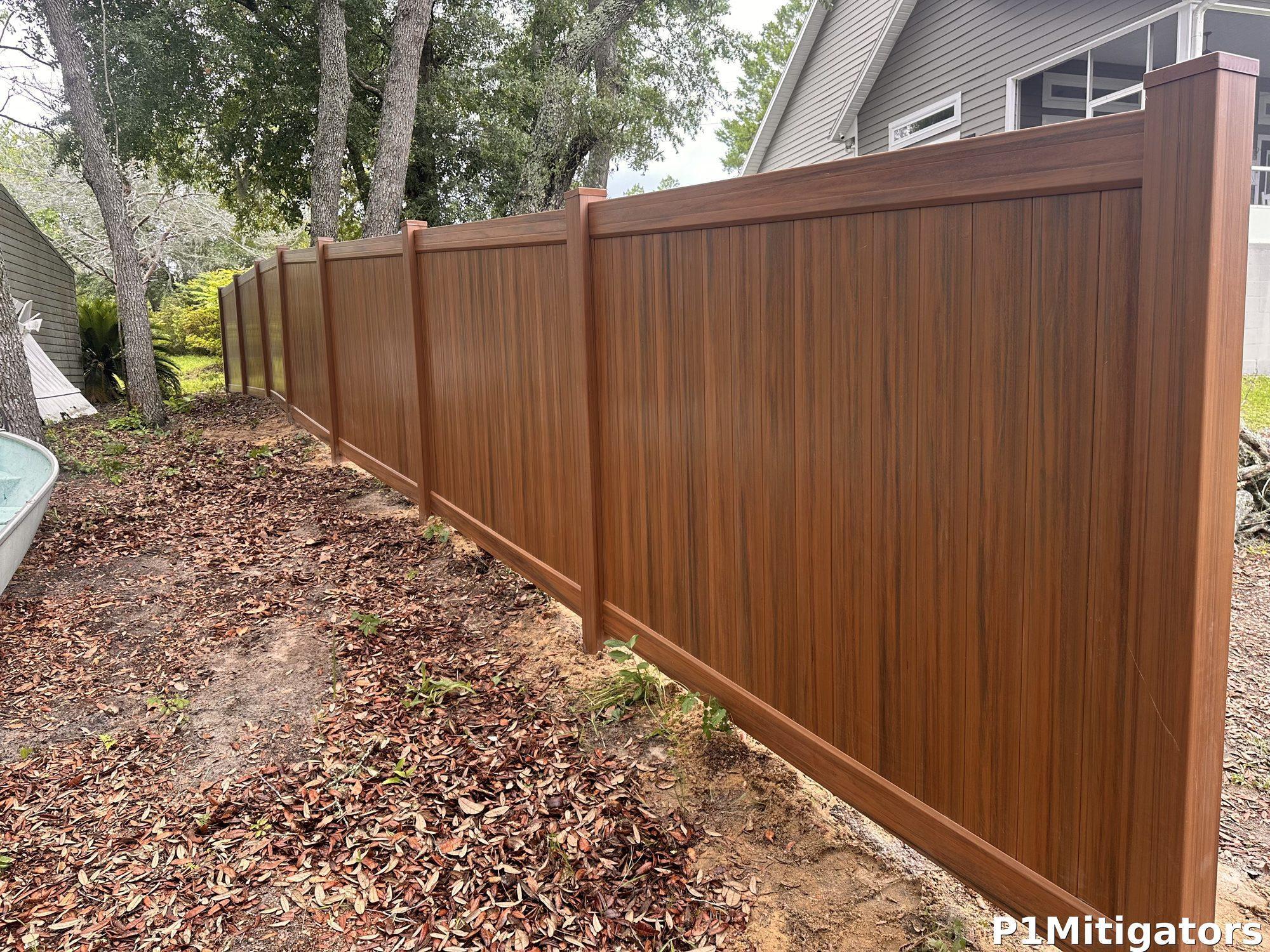 PVC / Vinyl Fencing project photo 2 by P1Mitigators Jacksonville FL