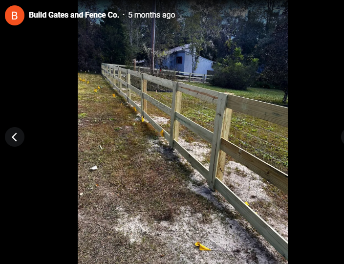 Ranch-style post and rail fence by Build Gates and Fence Co.