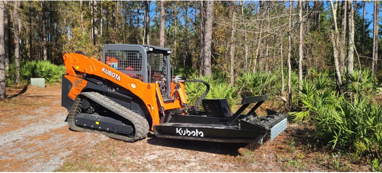 Forestry mulcher clearing a wooded Northeast Florida property