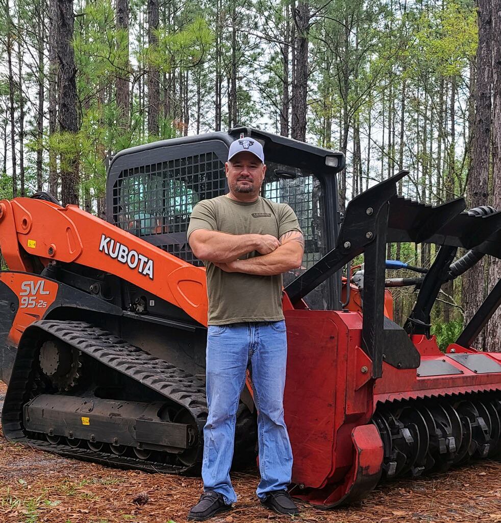 Legacy Land Management owner with Kubota forestry mulcher