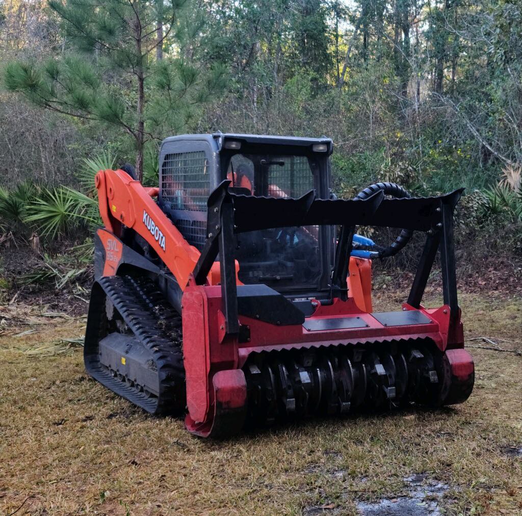 Legacy Land Management Kubota forestry mulcher clearing a Florida property